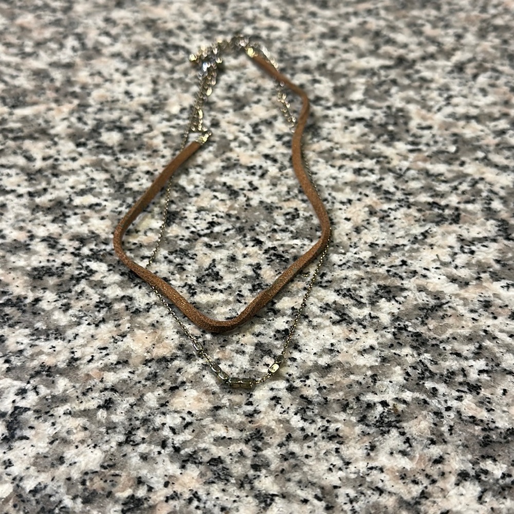 Gold and cord necklaces for layering
